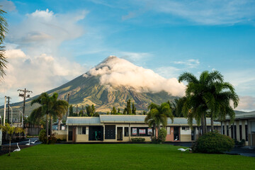Legazpi City, Albay, Philippines - Oct 2022: A drive-in motel with Mayon Volcano in the background.