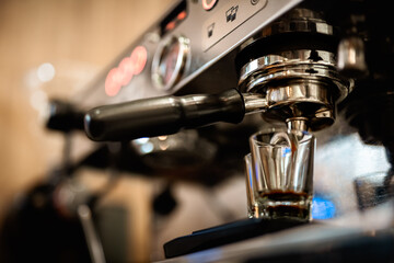 Fototapeta na wymiar Preparing fresh coffee. Closeup of tamping Fresh Ground Coffee.