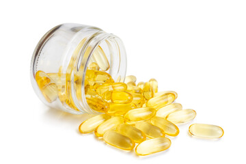 Omega 3 capsules in glass bottle isolated on white background. Softgels, tablets for skin, health,...