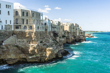 Spectacular houses of the old town of Polignano a Mare built on the cliffs above the Adriatic Sea...