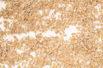 Oat flakes on white background, close up. oatmeal. barley flakes. rolled oat
