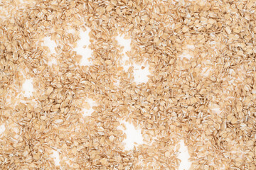 Oat flakes on white background, close up. oatmeal. barley flakes. rolled oat