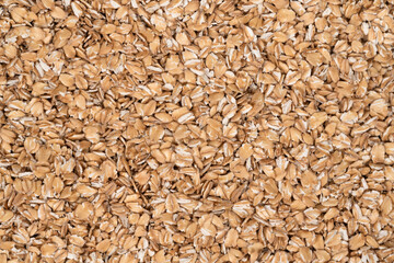 Oat flakes texture background, close up. oatmeal. barley flakes. rolled oat