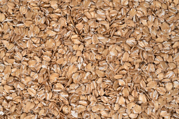 Oat flakes texture background, close up. oatmeal. barley flakes. rolled oat