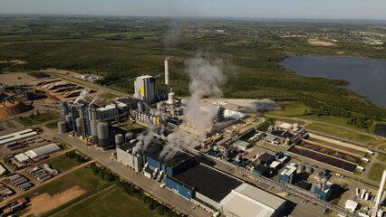 Toxic Smoke rising up from chimneys of industrial factory in Uruguay,South America