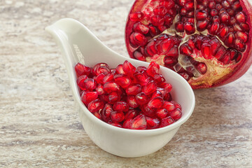 Ripe red Pomegranate seeds in the bowl