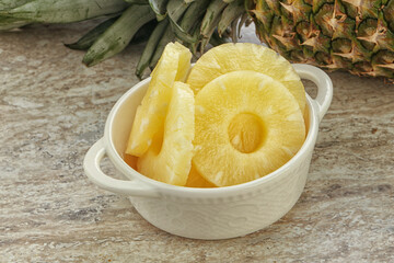 Marinated pineapple rings in the bowl