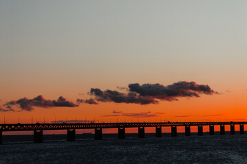 Fototapeta na wymiar Beautiful sunset over the bridge Oresund