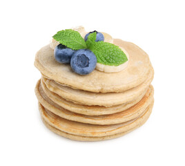 Tasty oatmeal pancakes and ingredients on white background