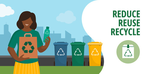 Woman holding items made of recycled materials