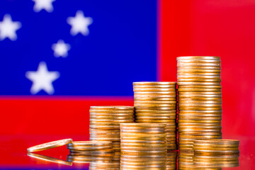 A stack of gold coins on the background of the flag of 
Samoa. Country economy concept