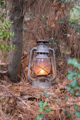 Fototapeta premium Vintage paraffin lamp shine in dark