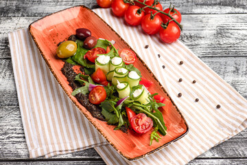 Greek salad, Greek salad on a white background, side and top view