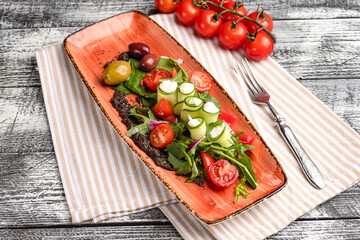 Greek salad, Greek salad on a white background, side and top view