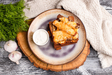 Garlic croutons, beer croutons on a wooden white background