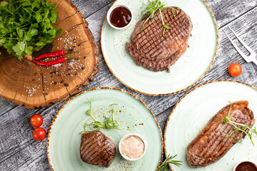 Steak, beef steak, grilled beef on a wooden white background