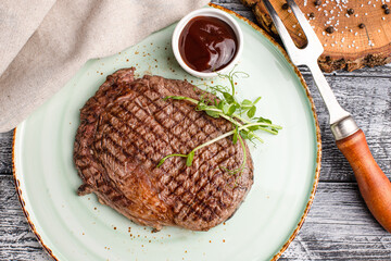 Steak, beef steak, grilled beef on a wooden white background