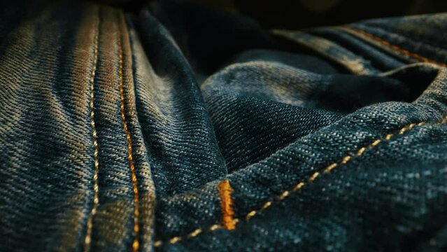 Denim blue jeans fabric texture. Close-up.