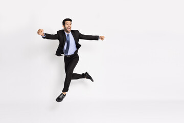 Fototapeta na wymiar Young businessman jumping in air isolated on white background, Full length composition