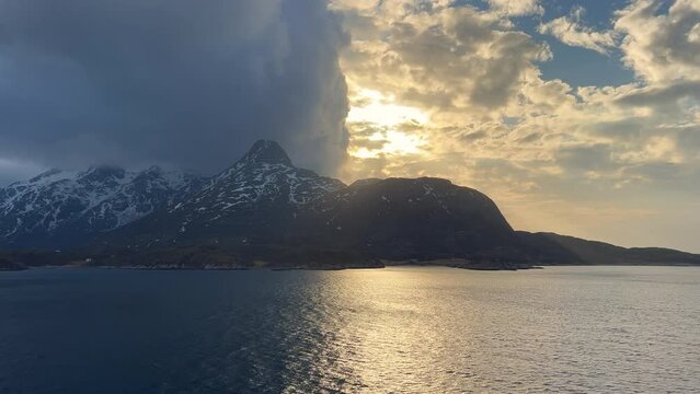 Navigating among manificent fjords, islands, islets, skerries, mountains and glaciers near Bod&oslash;, Nordland, Norway 
