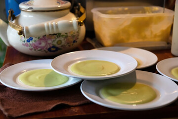 Egg custard cream topping with fresh milk usually serving with toasted.