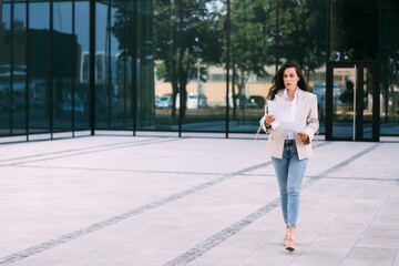 Fashion business woman with financial papers