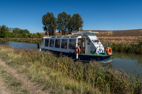 Fromista, Palencia, Spain; September 10, 2022; Tourist boat Juan de Homar through the Canal de Castilla.