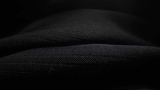 Classic black men's trousers. Close-up.