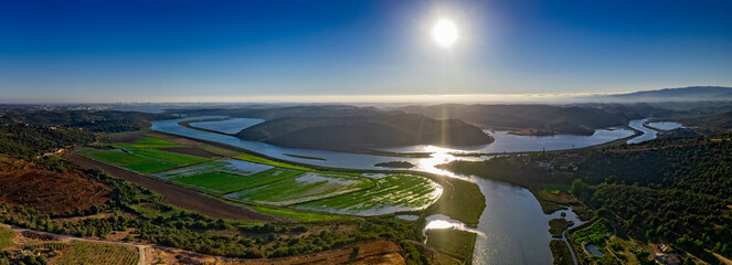 Aerial panoramic view of Algarve countryside landscape, above Arade river in Silves, a Popular Nature Destination Region, in South Portugal.