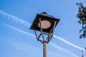 Antique street lamp against the blue