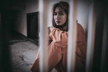 Hands of women desperate to catch the iron prison,prisoner concept,thailand people,Hope to be...