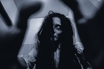 Portrait of asian woman make up ghost,Scary horror scene for background,Halloween festival...