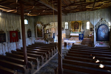 Fototapeta premium Interior of wooden church of St. Michael Archangel, Marsikov