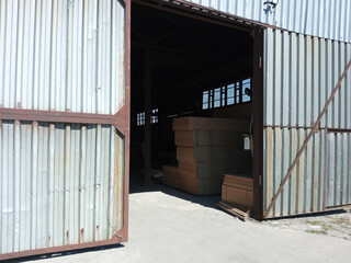 Fototapeta premium industrial old metal hangar. Warehouse space.