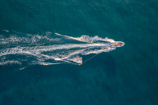 Aerial view of a motorboat sailing in the sea, Zonza, Corse, France.