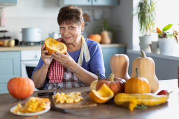 elderly woman cooking pumpkin