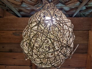 light bulb in a lamp is made of wood like a bird's nest.