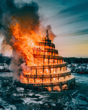 Aerial view of Babylon Tower on fire in Russia.