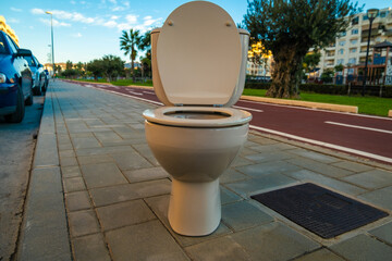 View of toilet in the middle of Malaga street in Spain - Powered by Adobe