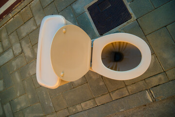 View of toilet in the middle of Malaga street in Spain