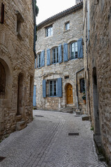 Fototapeta na wymiar in the streets of the village of Barjac, in the French department of Gard