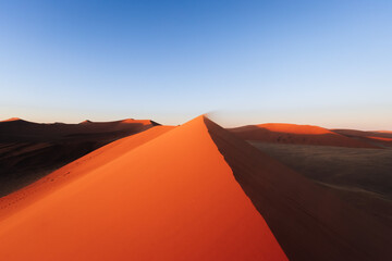 Fototapeta na wymiar incredible dunes during sunrise at sossuvlei national park in Namibia 