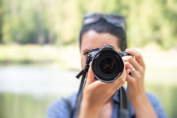 The photographer takes pictures.
