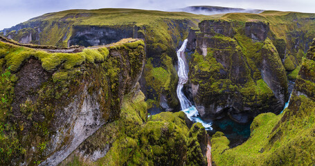 Naklejka na ściany i meble Landscape of Fjaðrárgljúfur Canyon (Iceland)