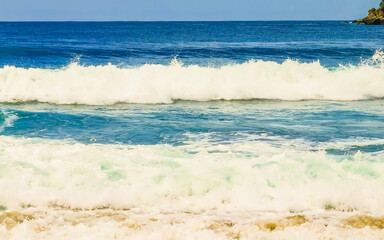 Extremely huge big surfer waves at beach Puerto Escondido Mexico.