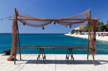 The beautiful sea view with fishing nets and clear blue sky in the summer, Zadar, Croatia.