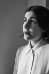 creative portrait of a young woman looking for an emotion of drama