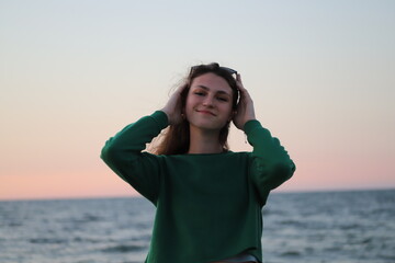 portrait of a beautiful girl by the sea