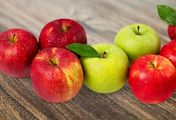 Fresh ripe juicy apple fruits on the desk