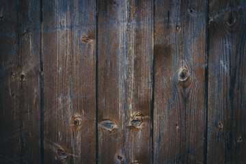 Fototapeta premium Vintage wooden surface. Dark wooden background of the boards with vignetting.